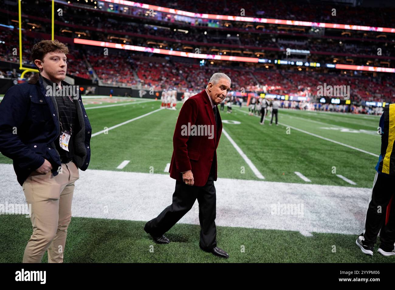 Atlanta Falcons owner Arthur Blank walks the field after an NFL ...