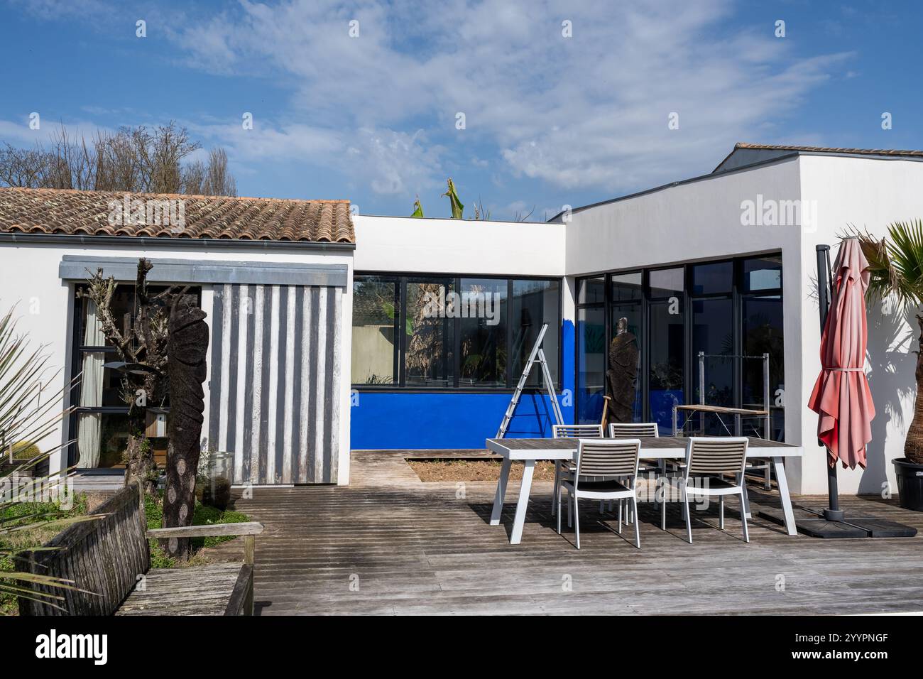 blue paint job on a modern house. blue House With Creative Colorful ...