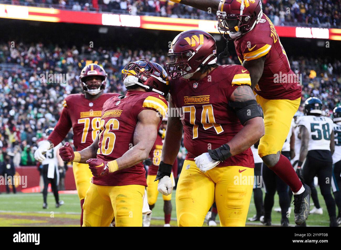 Washington Commanders running back Jeremy McNichols (26) celebrating