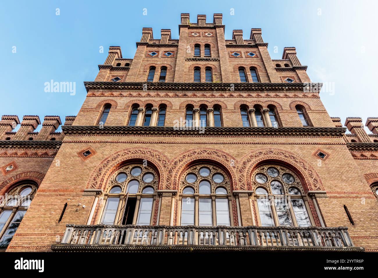 Large brick building balcony hi-res stock photography and images - Alamy