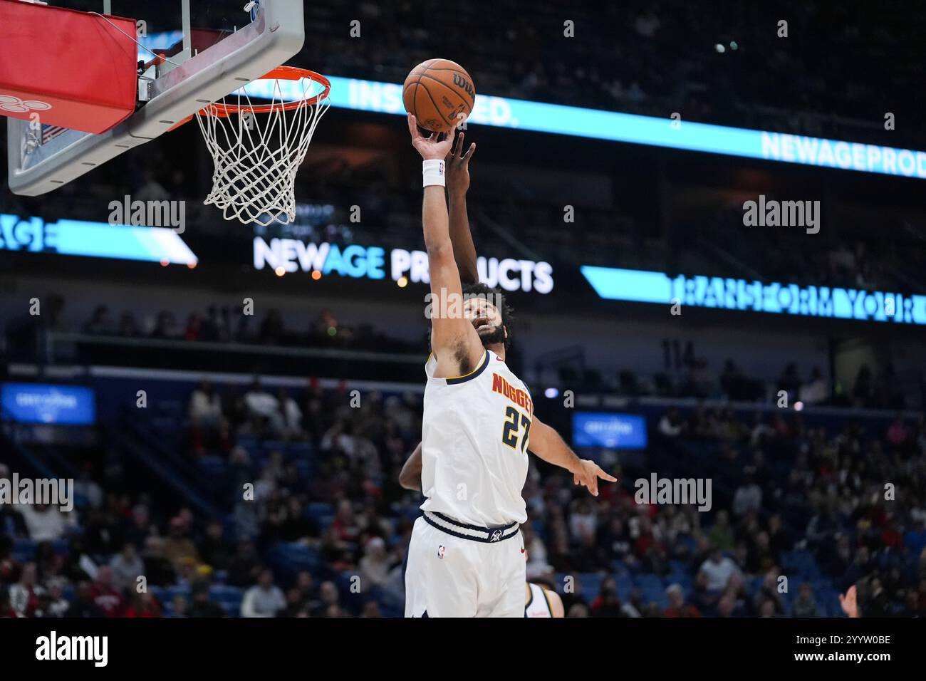 Denver Nuggets guard Jamal Murray (27) leaps for a rebound in the first
