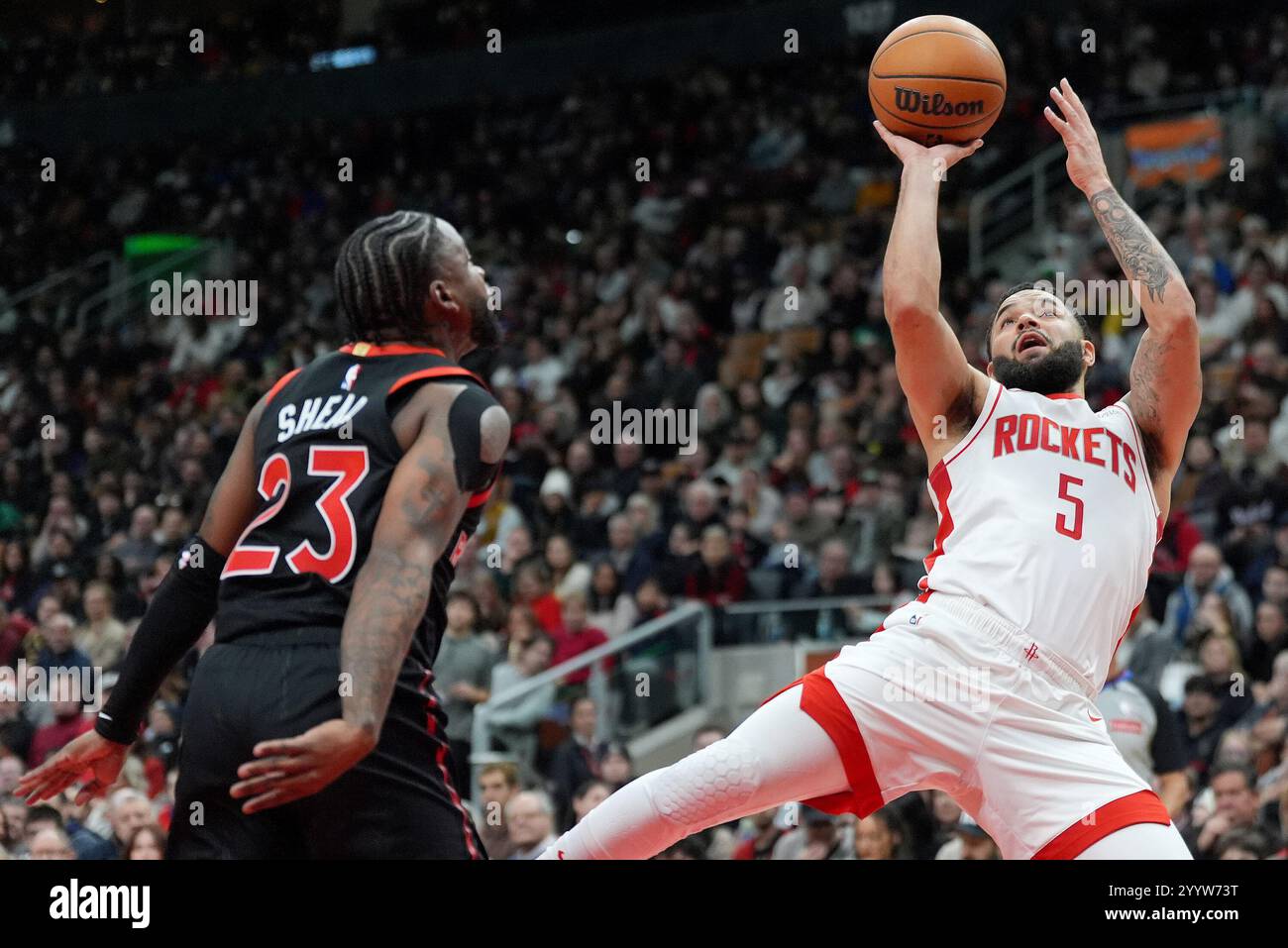 Houston Rockets guard Fred VanVleet (5) looks to shoot over Toronto ...