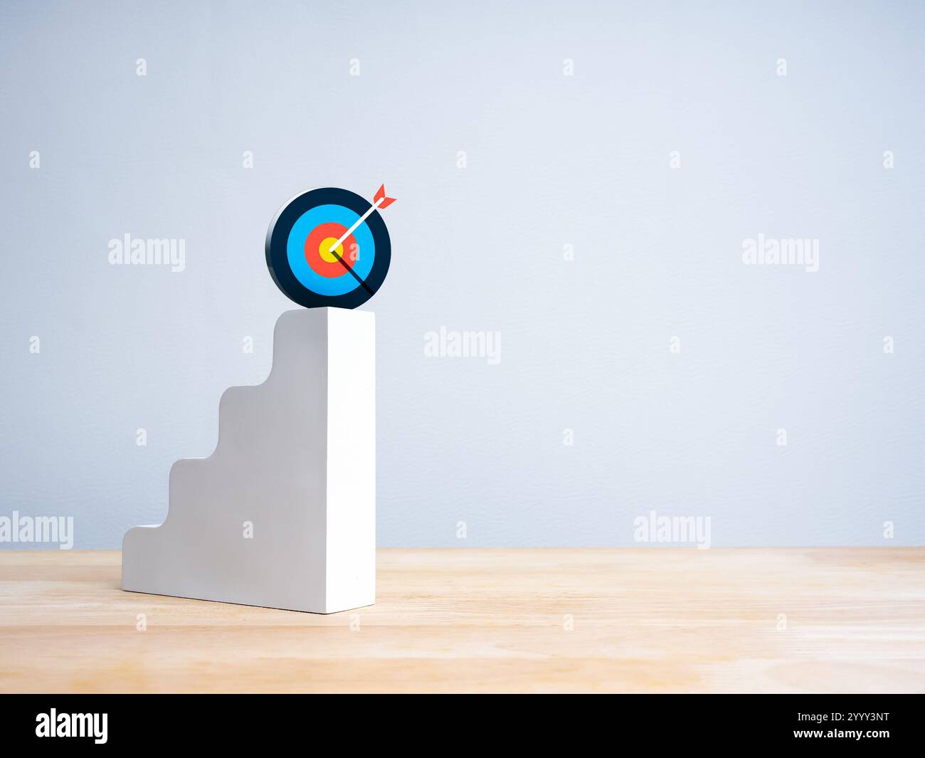 Modern colorful target icon on top of white 3d bar graph chart steps on ...