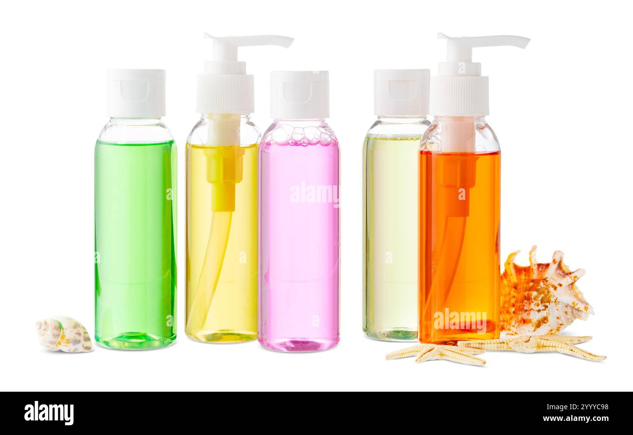 Assorted skincare products displayed on a white surface with a seashell Stock Photo