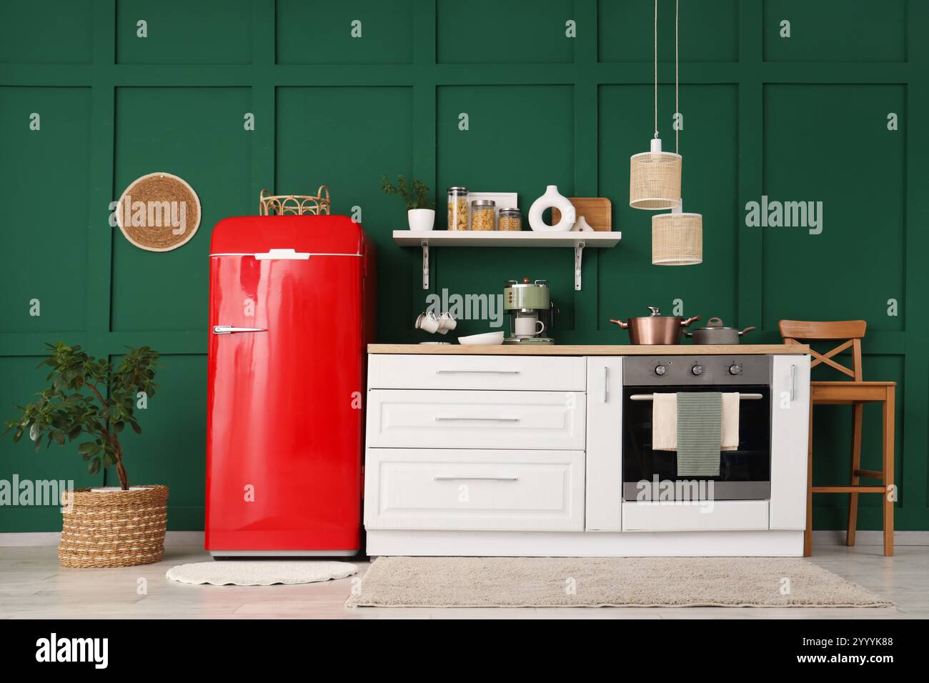 Interior of stylish kitchen with white counters, utensils and modern ...