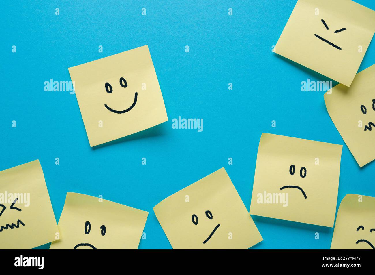 Adhesive notes or Sticky notes with different sad and happy emotions Stock Photo