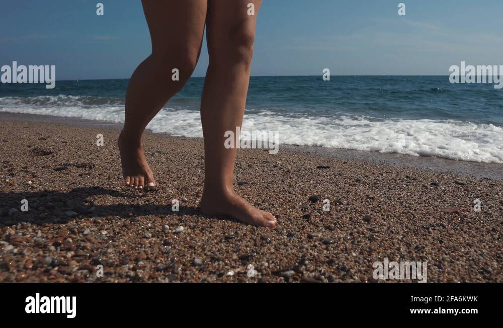 Walking on pebble beach and seaside Stock Videos & Footage HD and 4K