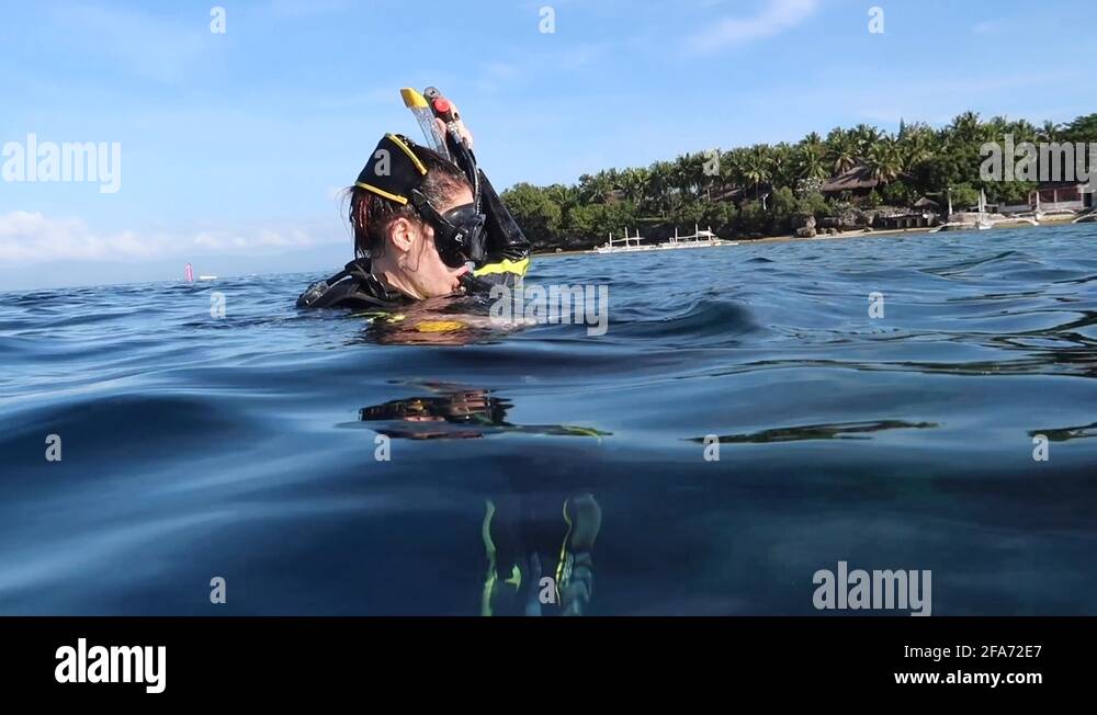 Scuba Diver Submerges Descends Under Water In Philippines Stock Video