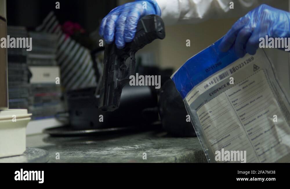 CSI Place Gun In Evidence Bag, Crime Scene Investigation Site