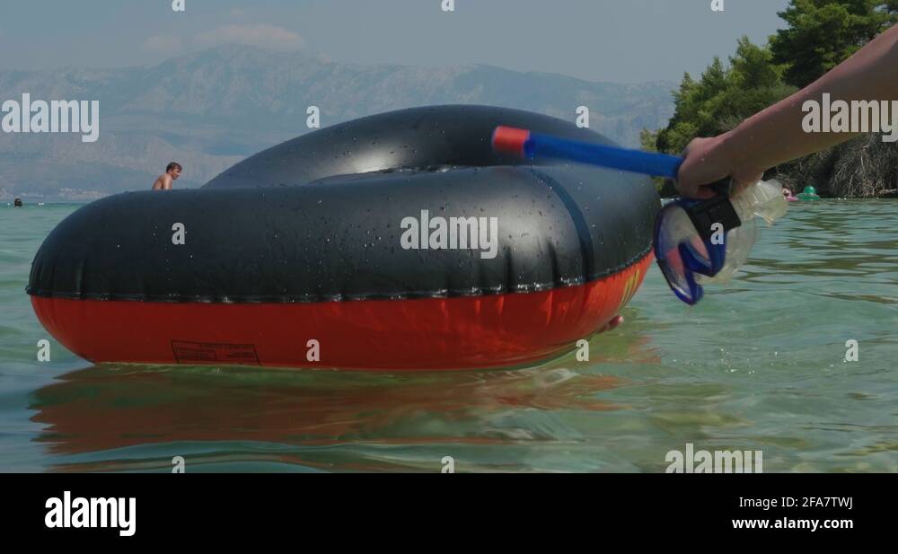 Mask snorkel inflatable Stock Videos & Footage - HD and 4K Video Clips ...