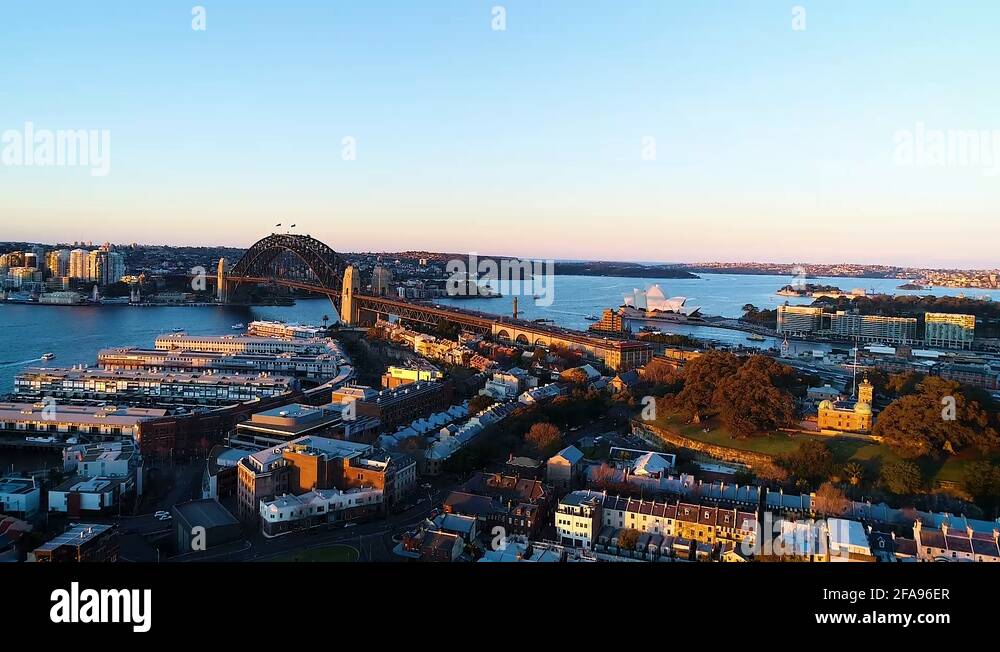 Sydney opera house and harbour bridge at sunset Stock Videos & Footage ...
