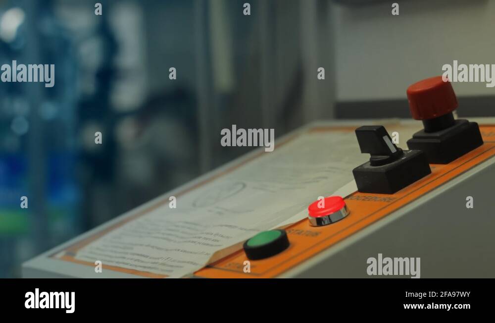 Remote control at the factory with a flashing red button Stock Video