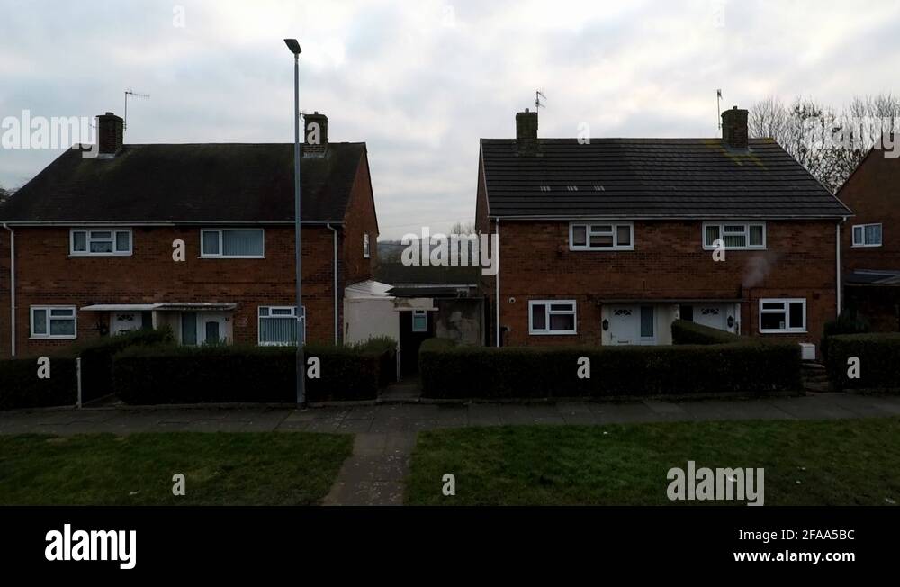 An aerial view of a council estate on recycling day, bin collection day