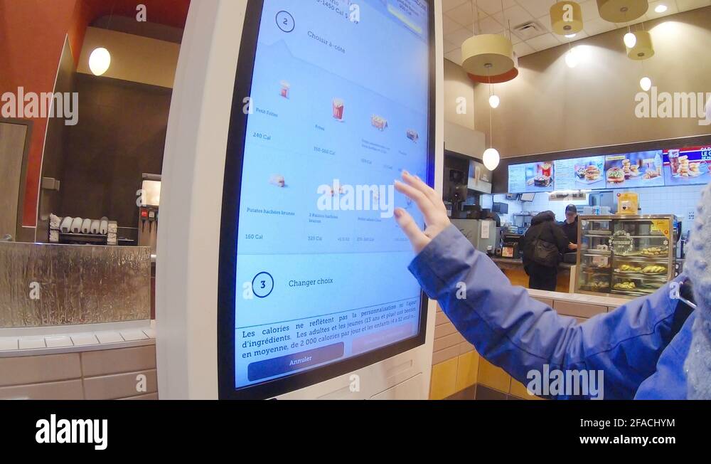 Using a McDonald's Touchscreen Kiosk To Order Food Stock Video Footage ...