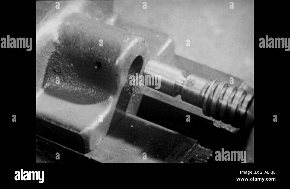 1940s Moveable jaw and shaft of clamp. Arrows indicate areas of