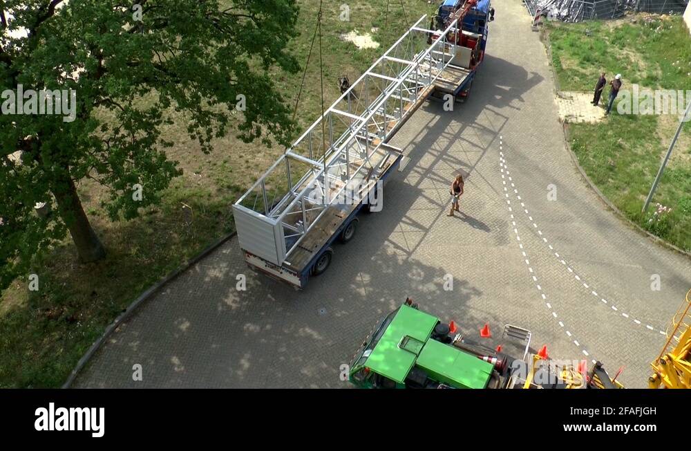 Mobile Crane Operator Unloading Elevator Shaft Top View Stock Video