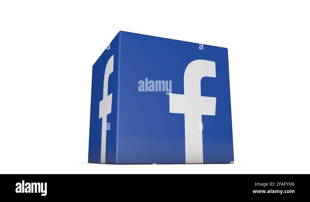 A spinning cube with theFacebook logo. Facebook is a popular social ...