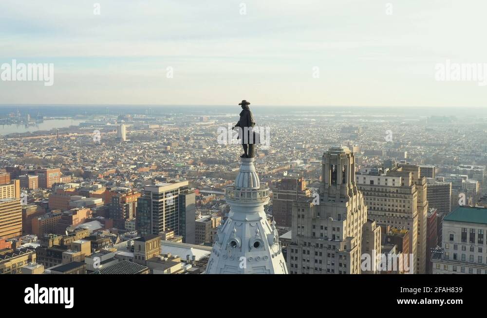 Aerial flyover William Penn Statue on top of the Philadelphia City Hall ...