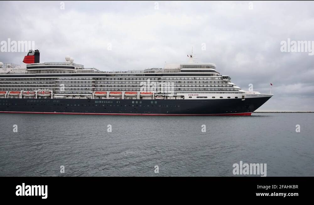 Queen Elizabeth Cruise Ship sailing into port Stock Video Footage Alamy