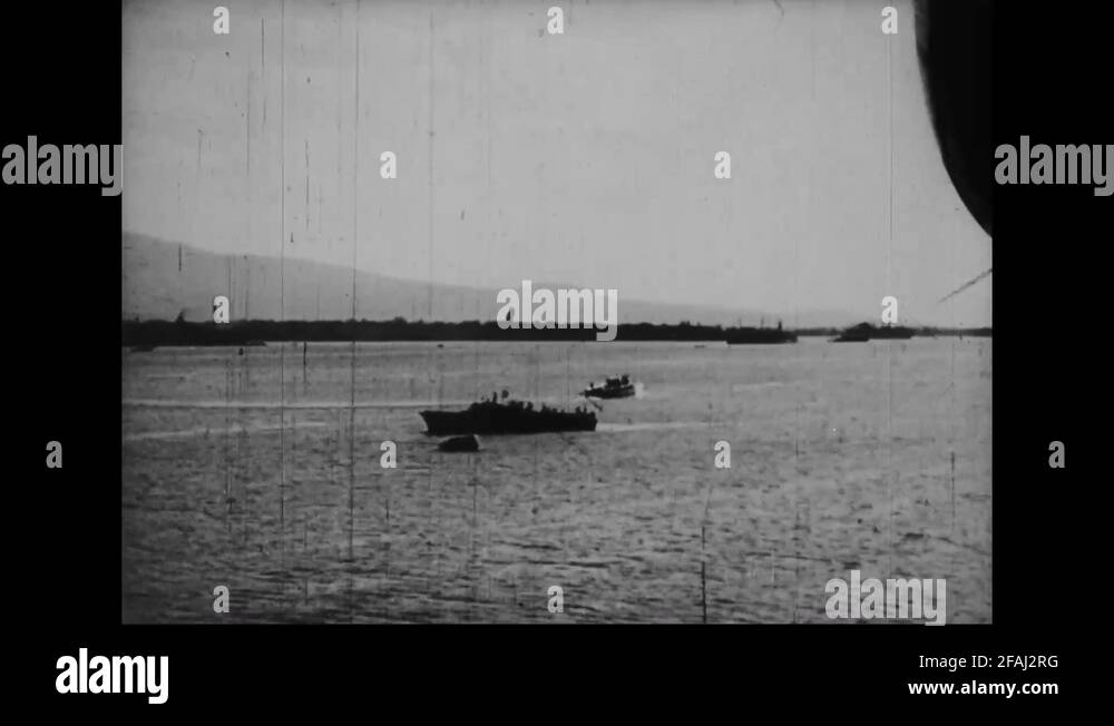 Scene of explosion in the sea, USS ship sailing - 1944 Stock Video ...