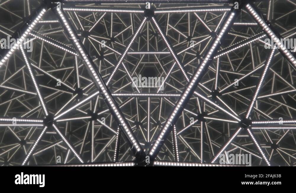 moving mirrored bright white triangles in a mesmerizing vision of art
