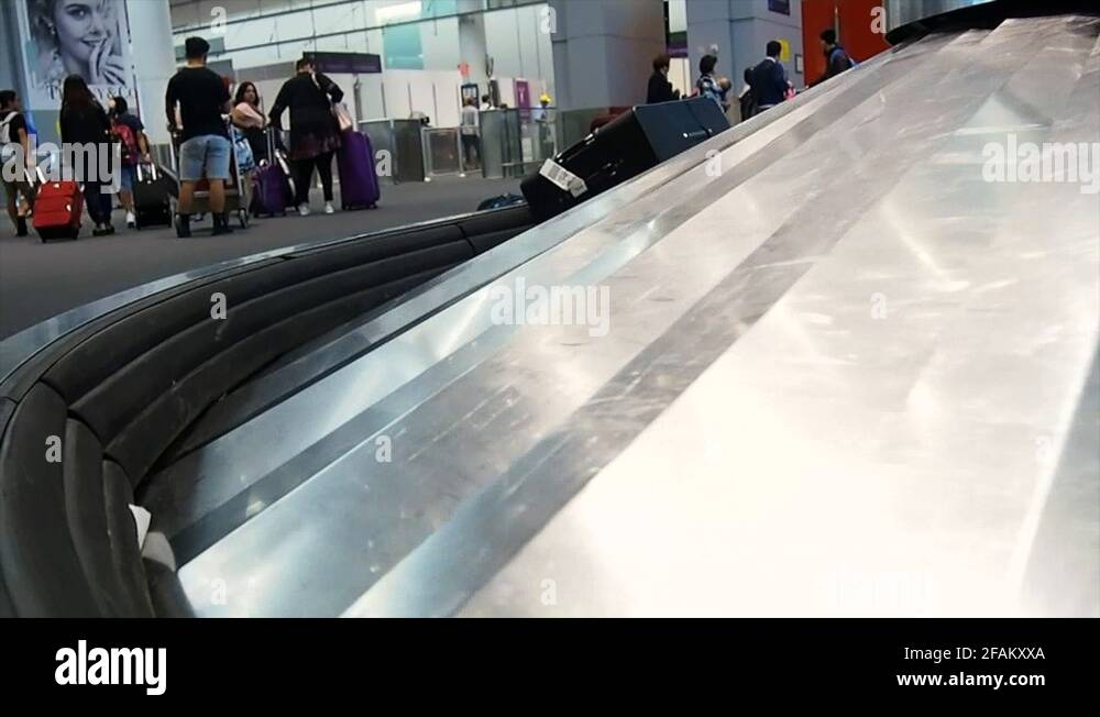 Luggage at Baggage Claim Stock Video Footage Alamy