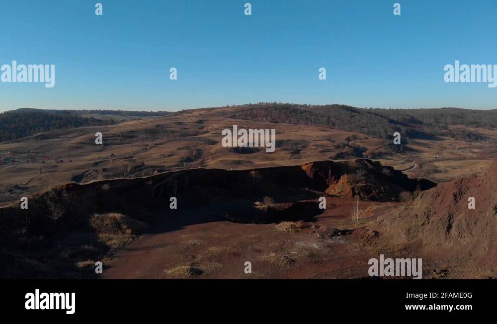 Vulcan Racos Drone ascending from the crater of Racos Volcano in Romania. Massive ...