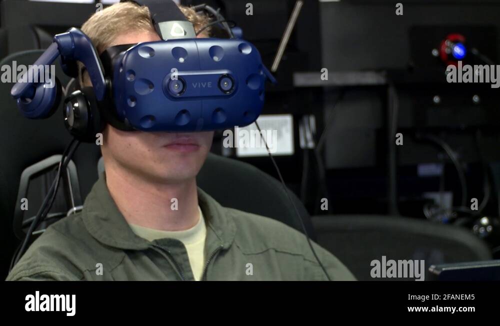 Pilot wearing virtual reality flight simulator headset during training
