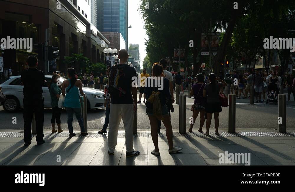 Singapore Circa Dolly out timelapse video of people crossing the busy
