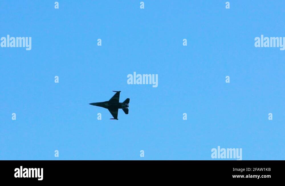 A fighter jet is making a turn Stock Video Footage - Alamy