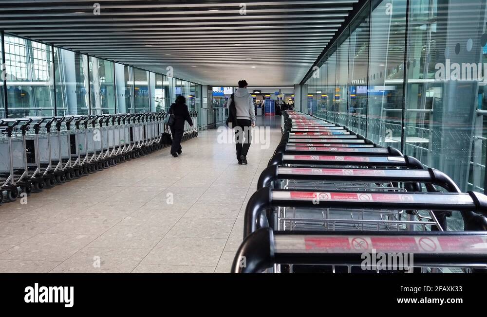 People in terminal 5 heathrow airport Stock Videos & Footage HD and