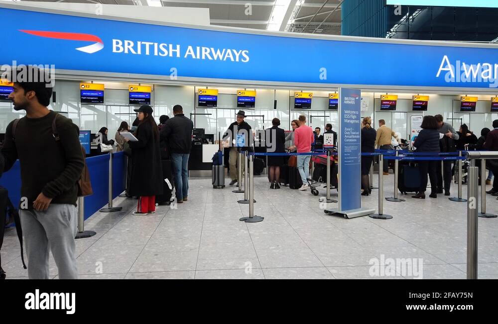 Ba Check In Stock Videos Footage HD And 4K Video Clips Alamy   British Airways Passengers Queue To Check In For Their Flights At Terminal 5 2fay75n 