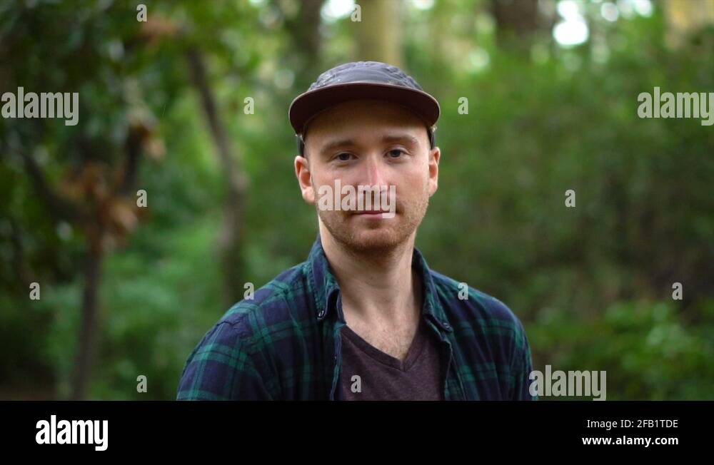 Creepy Young Man Staring Directly into Camera Portrait Stock Video