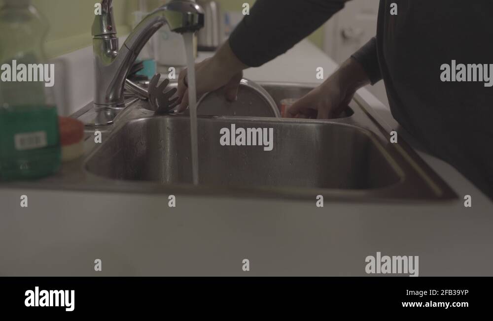 Man drying dishes Stock Videos & Footage HD and 4K Video Clips Alamy