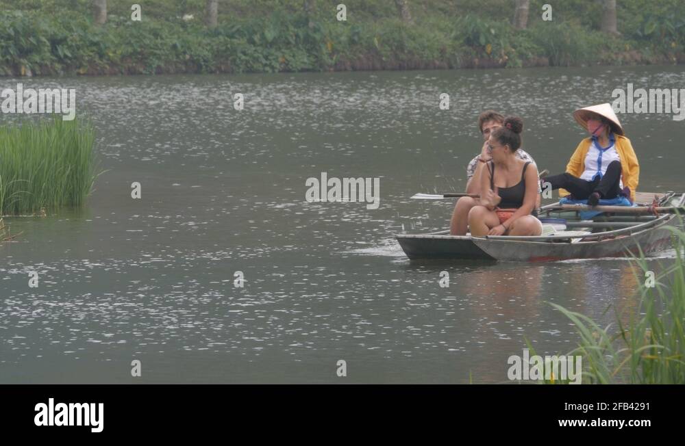 Vietnam woman rowing boat feet Stock Videos & Footage HD and 4K Video