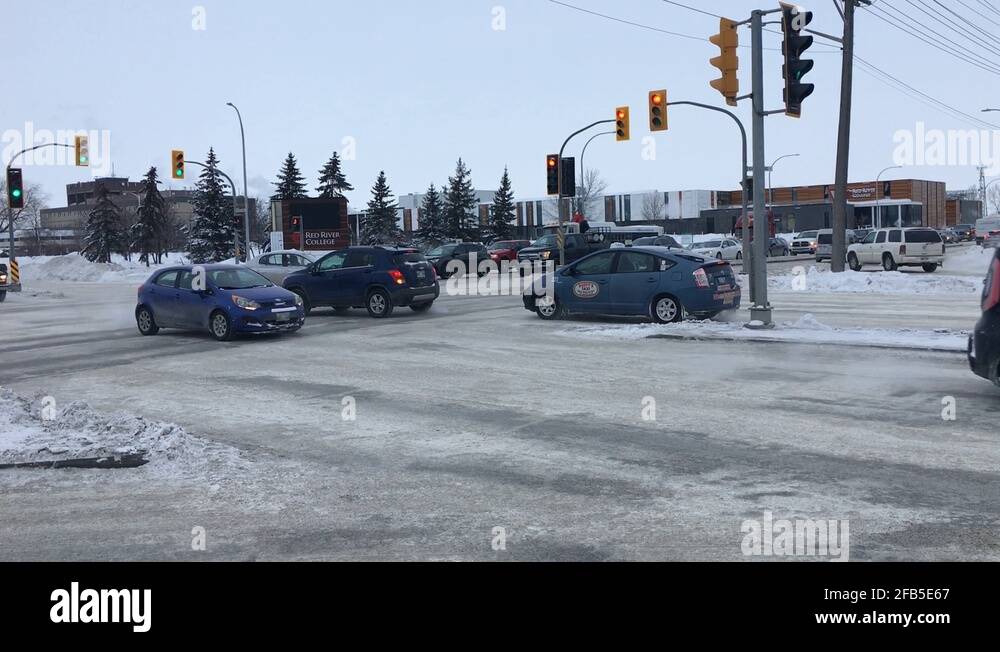 Traffic at intersection of Notre Dame Ave & Route 90 with Red River