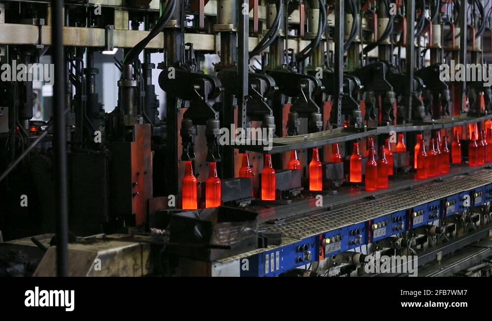 Manufacturing process of bottles in glass factory Stock Video Footage