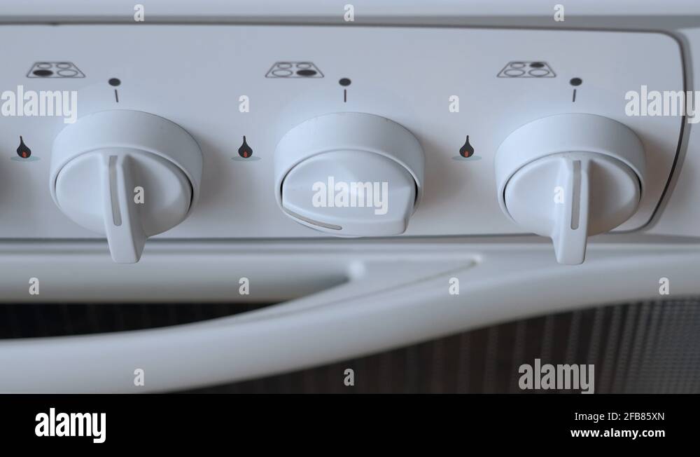 Man turn off gas stove gas Stock Video Footage Alamy