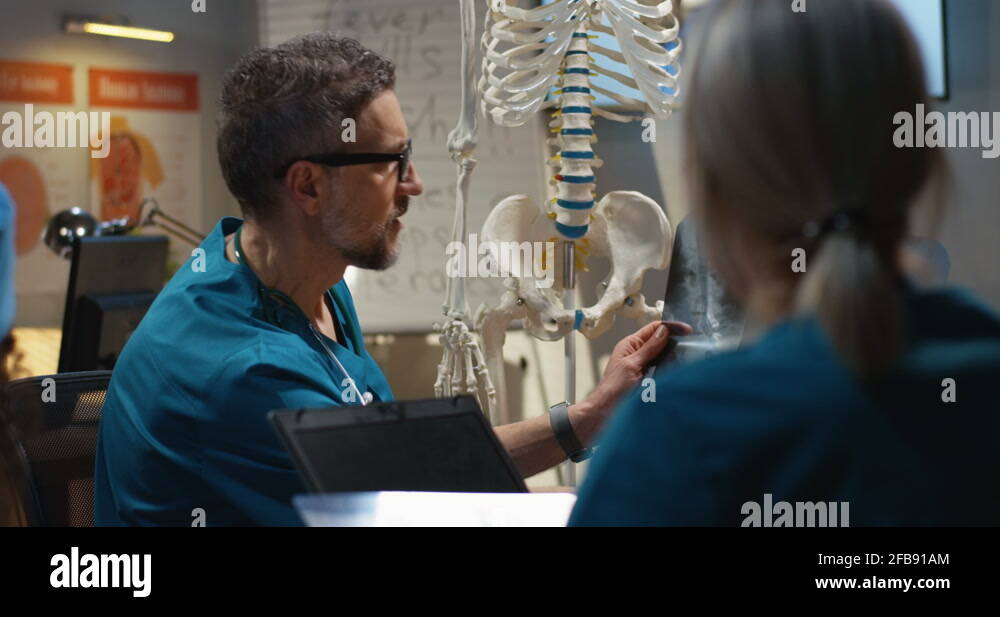 Doctors examining cervical spine x-ray Stock Video Footage - Alamy