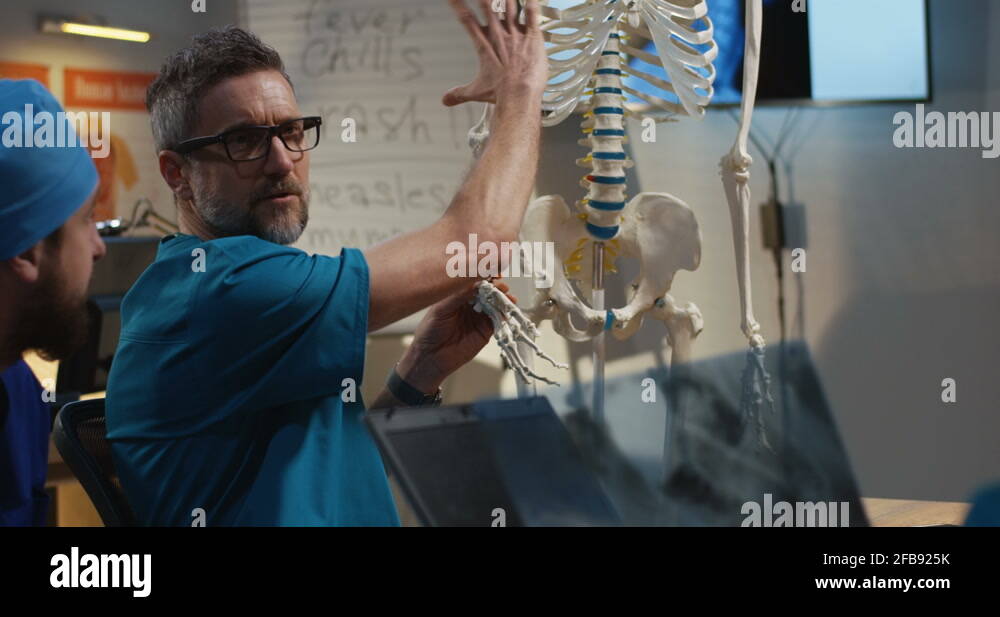 Doctors examining cervical spine x-ray Stock Video Footage - Alamy