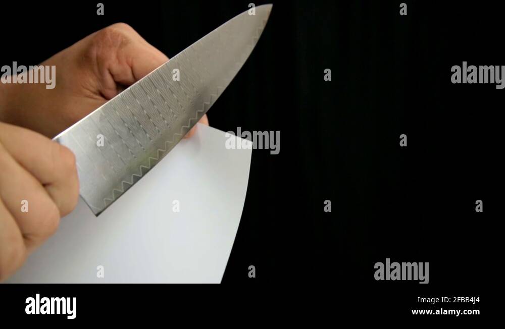 Knife cutting paper Stock Videos & Footage HD and 4K Video Clips Alamy