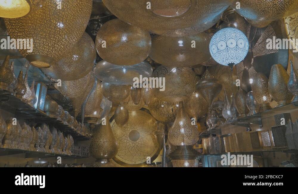 Panning through golden lantern decor beautifully crafted in a market