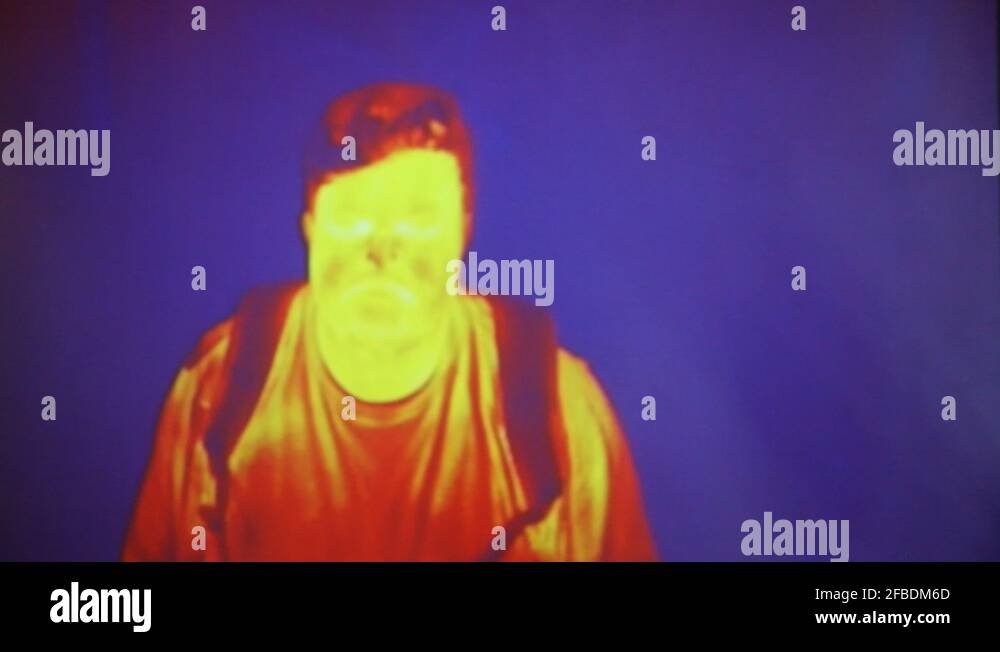 Infrared radiation thermal imaging camera of a man Stock Video Footage