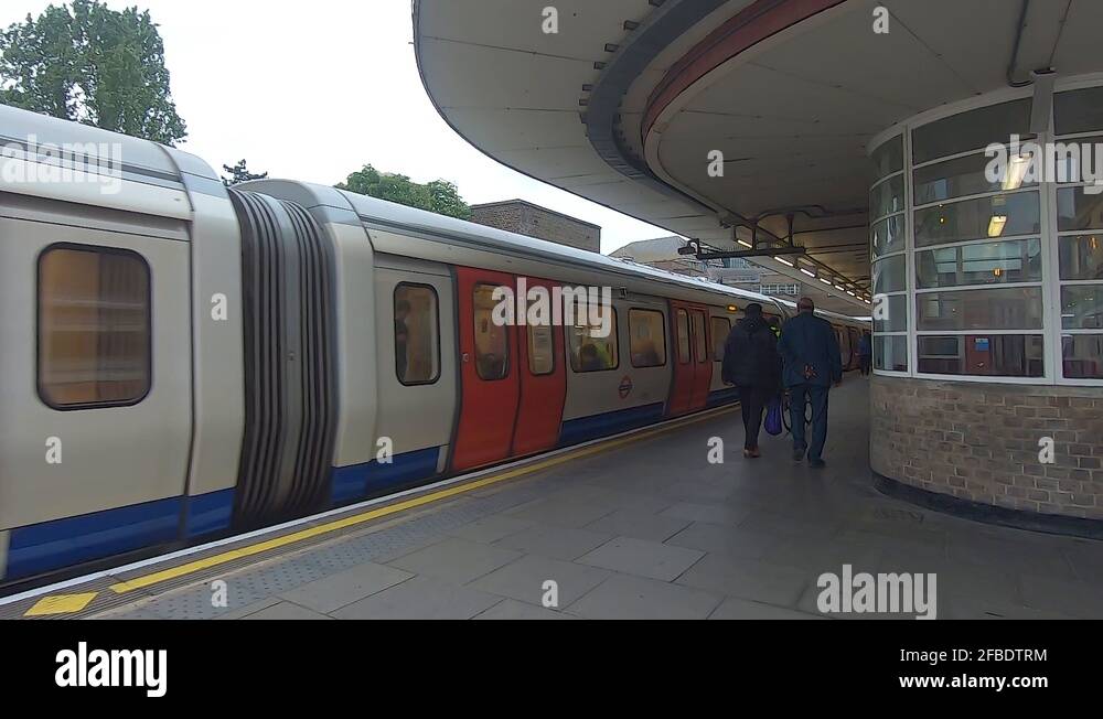 Metropolitan Line train departing platform 4 at Harrow on the Hill Station Stock Video Footage