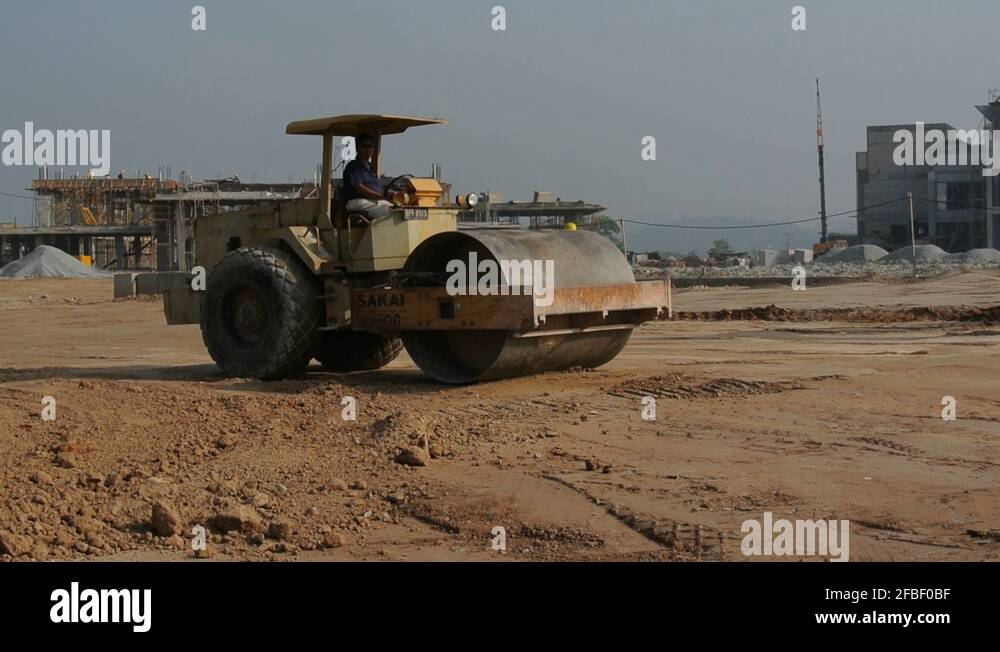 Single Drum Vibratory Rollers used to do compaction during earthwork at Stock Video Footage Alamy