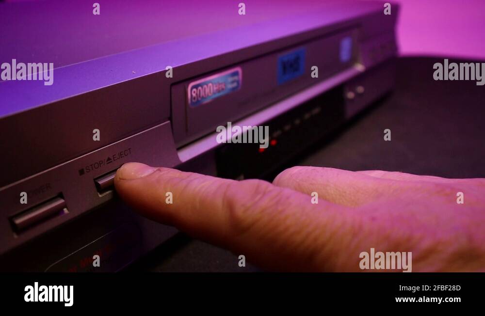 Ejecting Wedding Day VHS Video Tape Out Of A VCR Player Stock Video