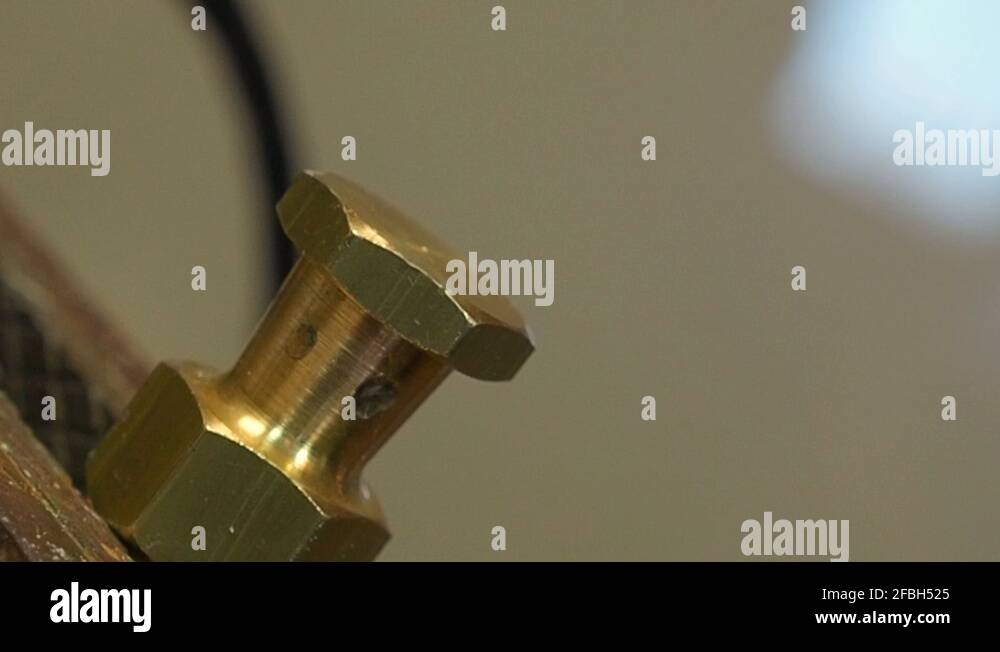 Measure Tool. Measuring brass nut and bolt with measure tool. Engineer