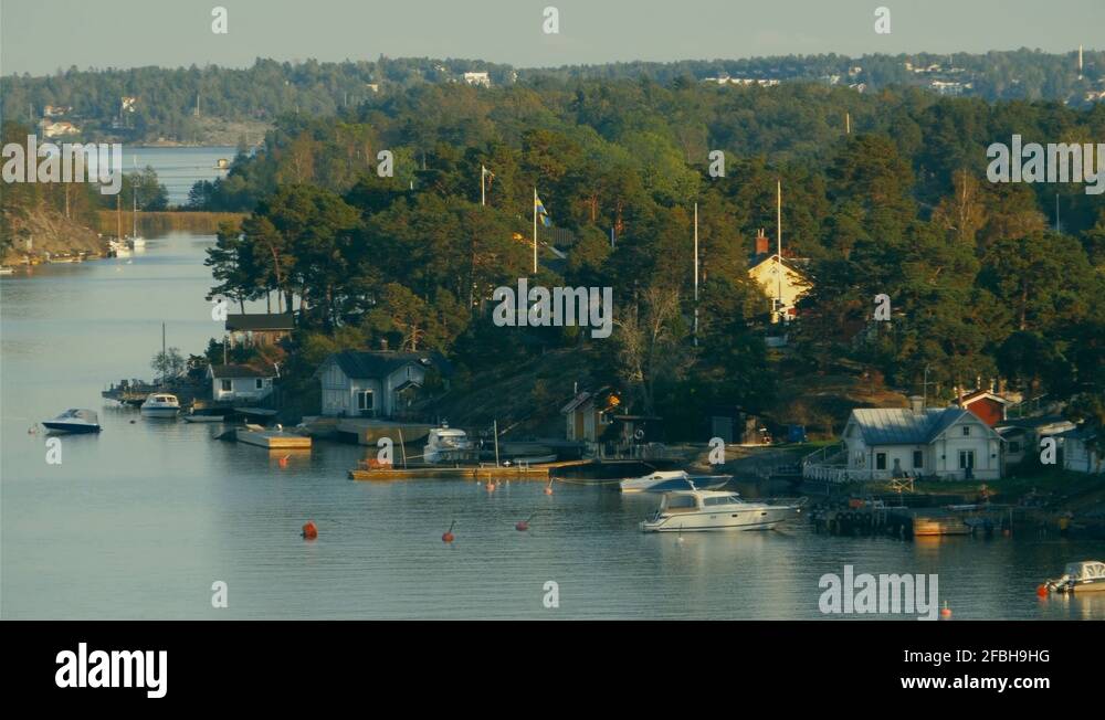 Houses, cottages, and cabins on a small island of an archipelago, each
