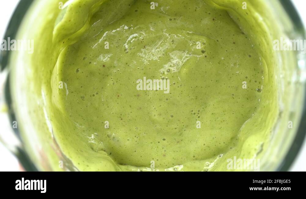 Fruits and vegetables blended up healthy green smoothie. Banana dill ...