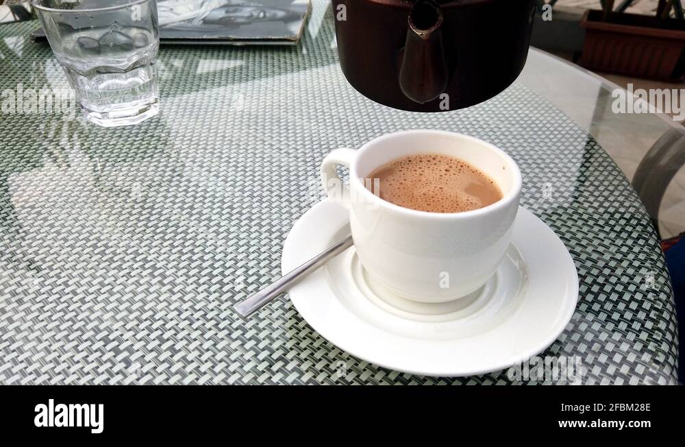 Indian white tea Stock Videos & Footage HD and 4K Video Clips Alamy